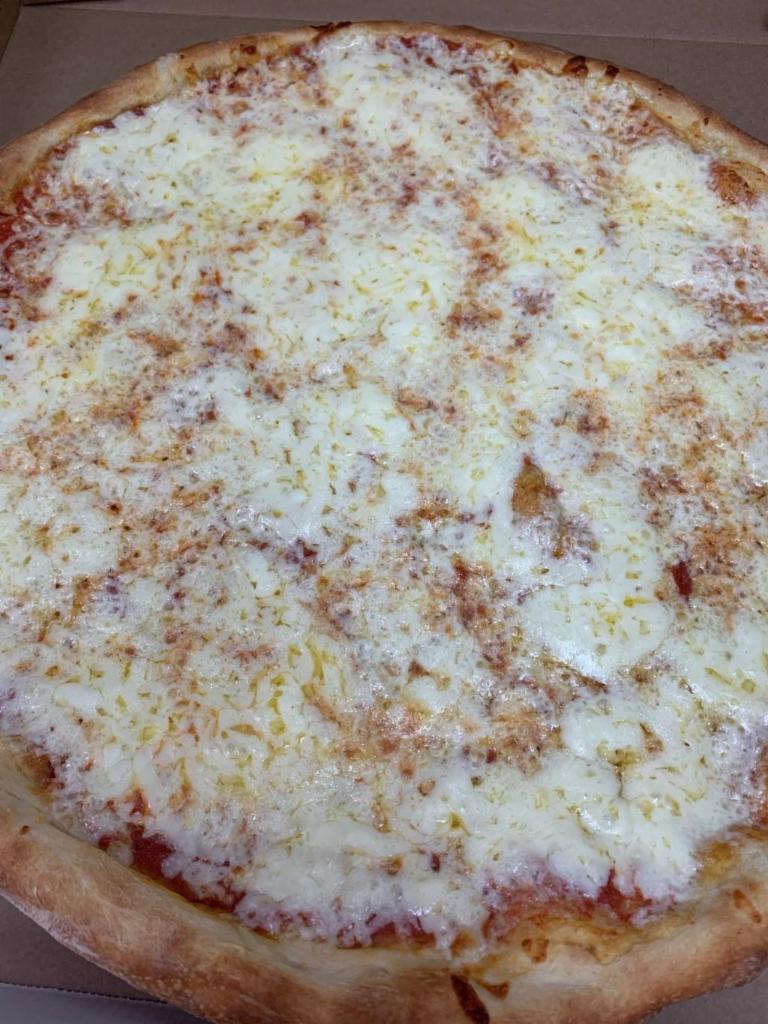2. Extra Cheese Pizza · Double mozzarella and homemade marinara sauce.