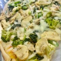 12. Veggie Lovers Pizza · Broccoli, mushrooms, pepper, onion, spinach, fresh garlic, mozzarella, and homemade marinara...