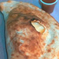 Veggie lovers calzone  · Broccoli spinach onions peppers mushroom mozzarella cheese ricotta cheese on the side marina...