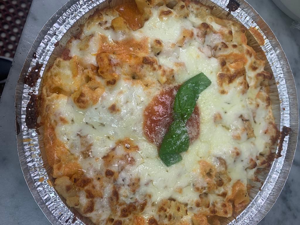 Baked ziti  · Ziti pasta homemade marinara sauce parmigiana cheese ricotta cheese fresh garlic mozzarella cheese