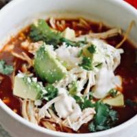 Tortilla Soup (Sopa Azteca) · Tortilla soup chipolte pepper, Chicken, Cheese, Avocado with rice