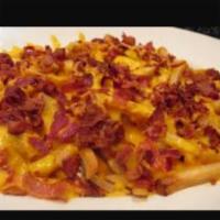 Bacon Cheese Fries · Cheese fries with bacon bits on top.