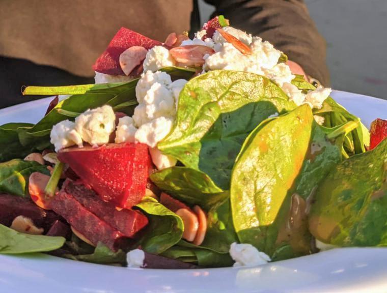 Roasted Beet & Goat Cheese Salad · Baby Spinach, Roasted Beets, Goat Cheese, Toasted Almonds, Balsamic Vinaigrette