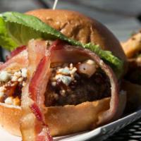 Branded Burger · With maple-glazed bacon, blue cheese, bourbon sauce, housemade pickles and sauteed onions. S...