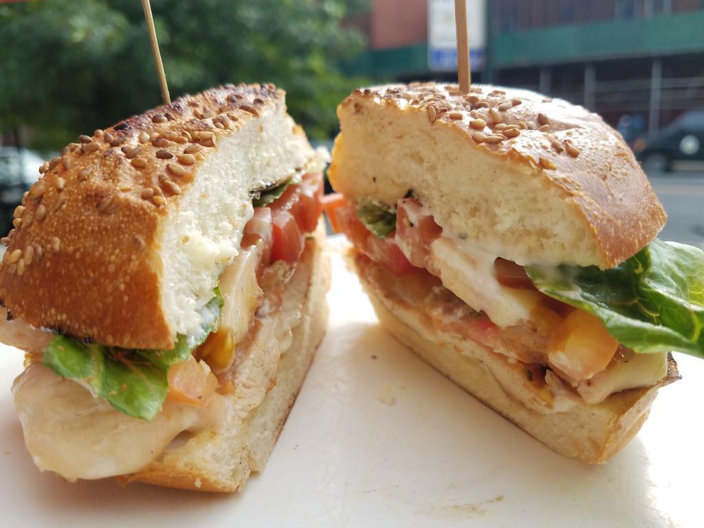 Grilled Chicken Club · Grilled Chicken, Bacon, Lettuce, Tomato, Chipotle Aioli, on a Bun , served with Fries