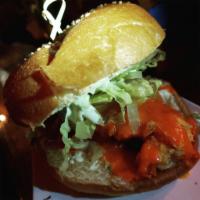 Fried Buffalo Chicken Sandwich · Buffalo Marinated Chicken, fried and assembled on a yummy sandwich with Blue cheese sauce, L...