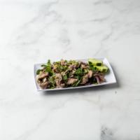 Larb Beef-Lao Style · Lemongrass, mint, scallions, onions, and cilantro.