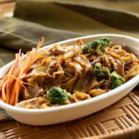 Pad Sa Eew · Big, flat noodles stir-fried with Chinese broccoli, egg, and sweet rice seasonings.