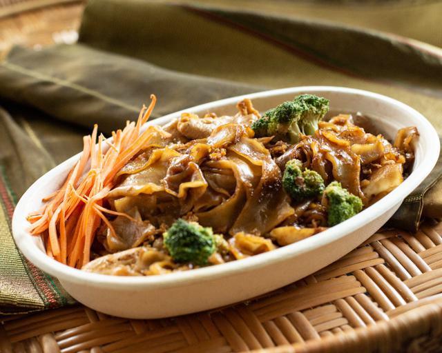 Pad Sa Eew · Big, flat noodles stir-fried with Chinese broccoli, egg, and sweet rice seasonings.