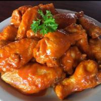 Jumbo Bone-in Wings  · All Natural Fresh Jumbo Wings, lightly breaded fried to crispy perfection, smothered in your...