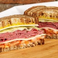  Pastrami · stacked high with thinly cut slices of cured Pastrami and served on freshly baked bread. Thi...