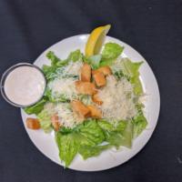 Caesar Salad · Romaine hearts, homemade garlic croutons and topped with fresh Parmesan cheese. Our signatur...