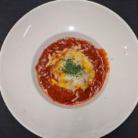 Traditional Lasagna · Our traditional lasagna is layered with a zesty meat sauce, ricotta cheese, noodles and mozz...