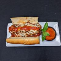Meatball Sandwich · House made meatballs topped with veggie marinara, grilled onions, and Parmesan cheese.