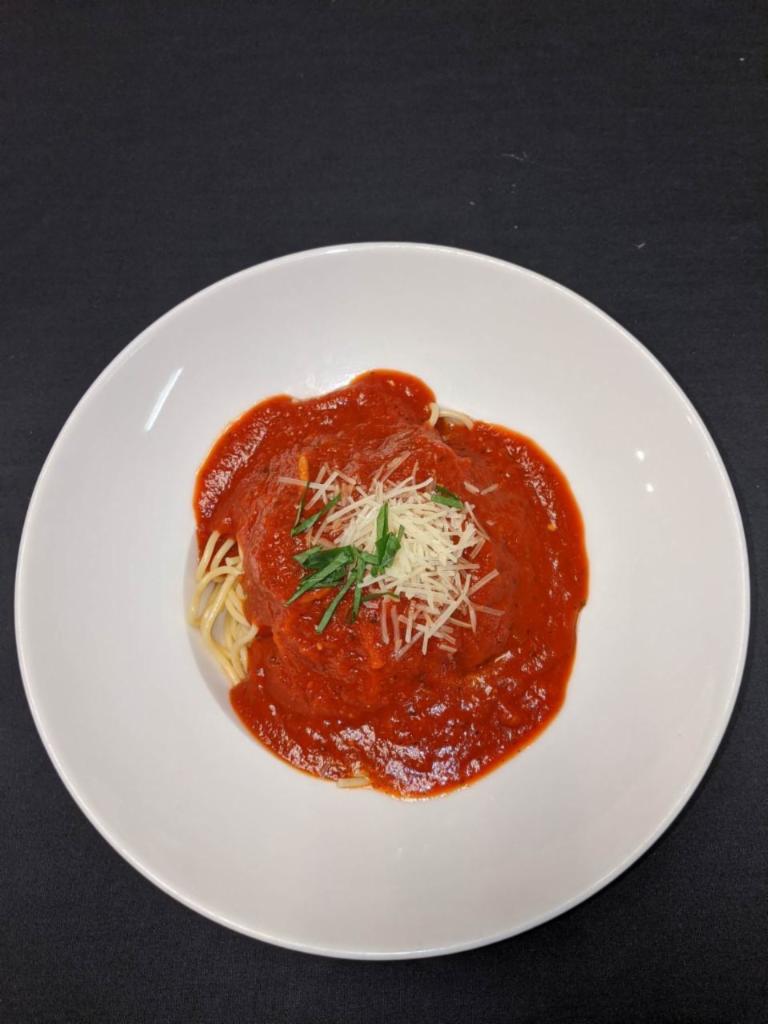 Kids Spaghetti · Classic spaghetti noodles topped with a veggie marinara sauce and garnished with Parmesan.