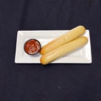 Garlic Bread Sticks · 2 garlic breadsticks with a side of our house made veggie marinara sauce.