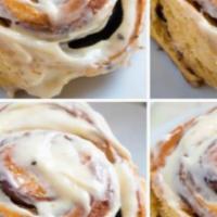 Cinnamon roll with candied pecans  · Handmade with brown butter sauce if this will be the best cinnamon roll you’ve ever had. 

O...