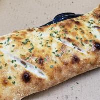 Stromboli  · Mozzarella provolone cheese, Marinara sauce, Salami, Ham, & Pepperoni