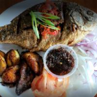 Whole Fish Platter · Fried or grilled whole tilapia with 1 side of your choice, add mixed pepper stir fry on top ...
