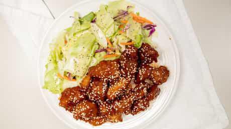 Orange Chicken · Battered and cooked in a sweet orange sauce.
