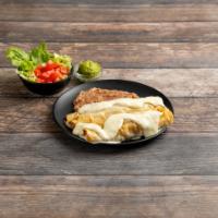 Chimichangas · 2 flour tortillas fried or soft filled with chicken or beef, nacho cheese, refried beans, or...