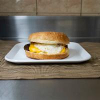 Texas Burger · Egg over easy with onions, peppers and cheese.