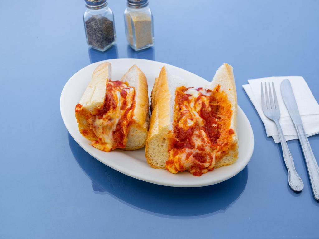 Chicken Cutlet Parmigiana Sandwich · Breaded chicken cutlet toasted with melted mozzarella cheese and marinara sauce 