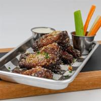 Garlic Parm Wings Aka Joe Newton · Garlic butter sauce, grated Parmesan cheese, chives. 8 hand-tossed crispy wings served with ...
