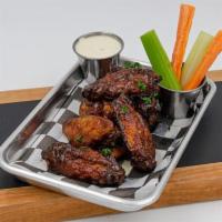 Smoke BBQ Wings Aka George Applewhite · Sweet BBQ sauce, crispy fried pickled red onions. 8 hand-tossed crispy wings served with hou...