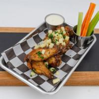 Sweet Pineapple Chili Wings Aka James Younger Gang · Sweet pineapple chili glaze, pineapple chunks. 8 hand-tossed crispy wings served with house-...