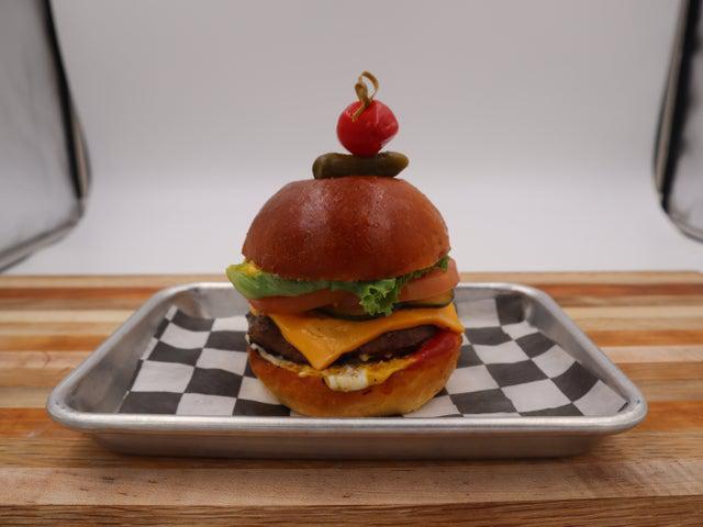 Classic Cheese Burger AKA King Fisher · Cheese, Lettuce, Tomato, Onion, Pickles, Mustard, Mayo, Ketchup