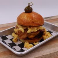 Bacon Mac Burger Aka Wyatt Earp · 1/2 lb beef patty, bacon, mac & cheese, brioche bun. Our chefs famous burgers! Every patty i...