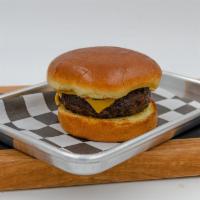Kids Cheese Burger · Beef patty, American cheese, brioche bun. served with fries or tots and a small drink.