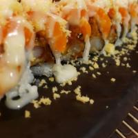 Salmonholic Roll · In: spicy salmon, shrimp tempura, and cucumber. Out: salmon, and crunchy. Sauce: yuzu, yum y...