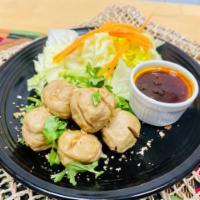 Ma Kin Pork balls  · Deep fried Pork balls served with Chef’s special sauce 