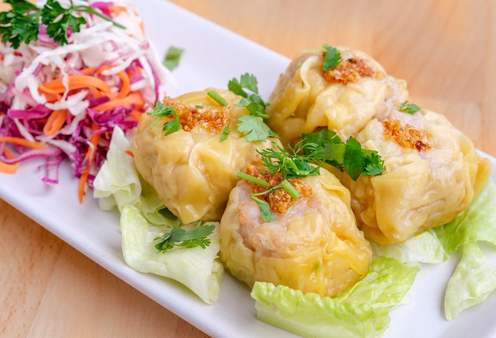 Thai Dumpling · Steamed or fried chicken & shrimp dumplings.