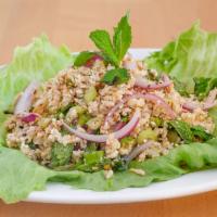 Pork Labb · Spicy minced chicken with red onion, cilantro, mint leaves, chili and lime juice. Hot and sp...