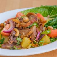 Duck Salad · Sliced roasted duck with romaine, tomato, pineapple, and cashew nuts in spicy chili lime jui...