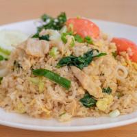 Thai Fried Rice · Fried rice with choice of meat, egg, Chinese broccoli, tomatoes, onions and cilantro. Hot an...