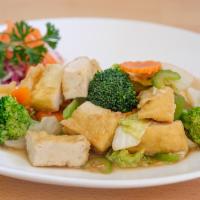 Mixed vegetables and Tofu  · Sautéed mixed vegetables and tofu in garlic sauce.