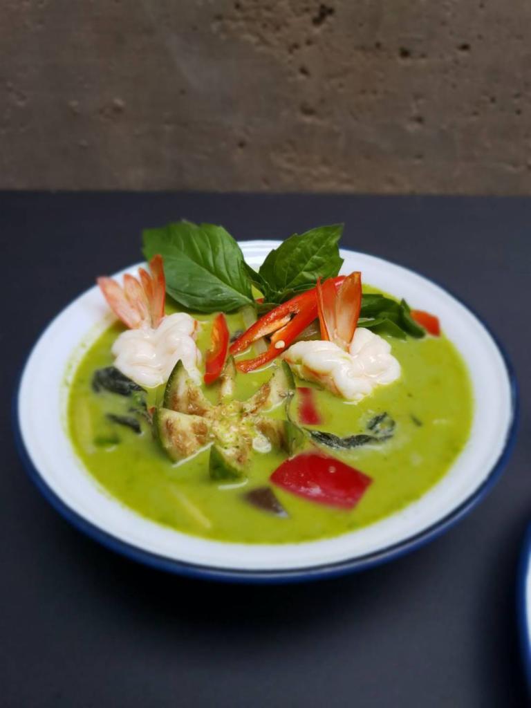 Green Curry · Eggplant, bamboo shoot, eggplant,fresh basil, and bell pepper in coconut milk. Hot and spicy.