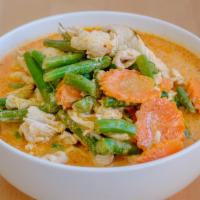 Panang Curry · String bean, kaffir lime leaves, and carrot in coconut milk. Hot and spicy.