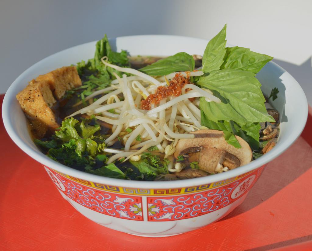 Vegan Pho Soup (Served Daily) · Fried tofu, mushrooms, and kale in a spiced vegetable broth. Served with rice noodles, bean sprouts, cilantro, scallions, fried garlic, and basil.