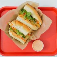 Catfish Sandwich · Fried catfish filet, with turmeric, dill, scallion oil, peanuts, pickled carrots and daikon,...