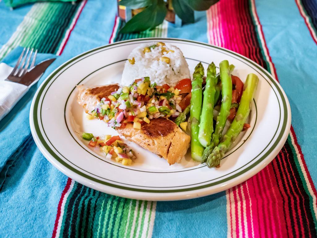 Salmon con Mango Salsa · Pan-seared salmon served with jalapeno and mango salsa with side of white rice and asparagus.