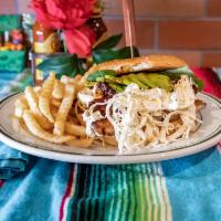 Cemitas Sandwich · Toasted sesame seed bun with mayo spread filled with beans, Oaxaca cheese, avocado, tomato, ...