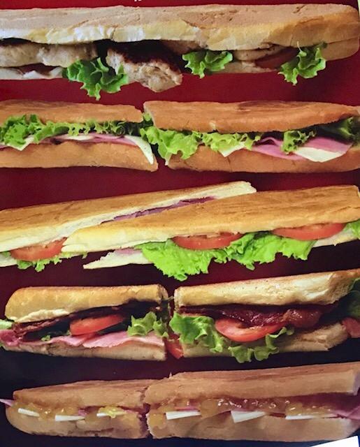 Regular Sandwich · Ham, cheese, lettuce, tomato, garlic sauce.