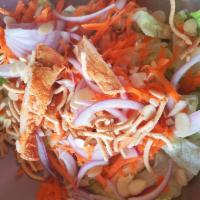 Asian Chicken Salad · Romaine lettuce, almonds, carrots, onions, orange, Asian noodles, grilled chicken and Chines...