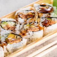 Grilled Salmon Roll · Roll with grilled salmon, avocado, ＆ cucumber, topped with teriyaki sauce.