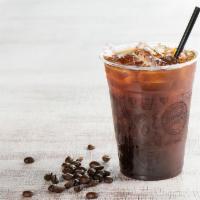 Iced Americano · Shot of espresso with added water poured over ice served black.